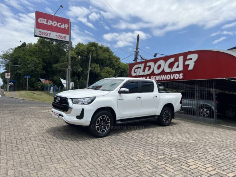 TOYOTA - HILUX - 2022/2022 - Branca - R$ 234.900,00